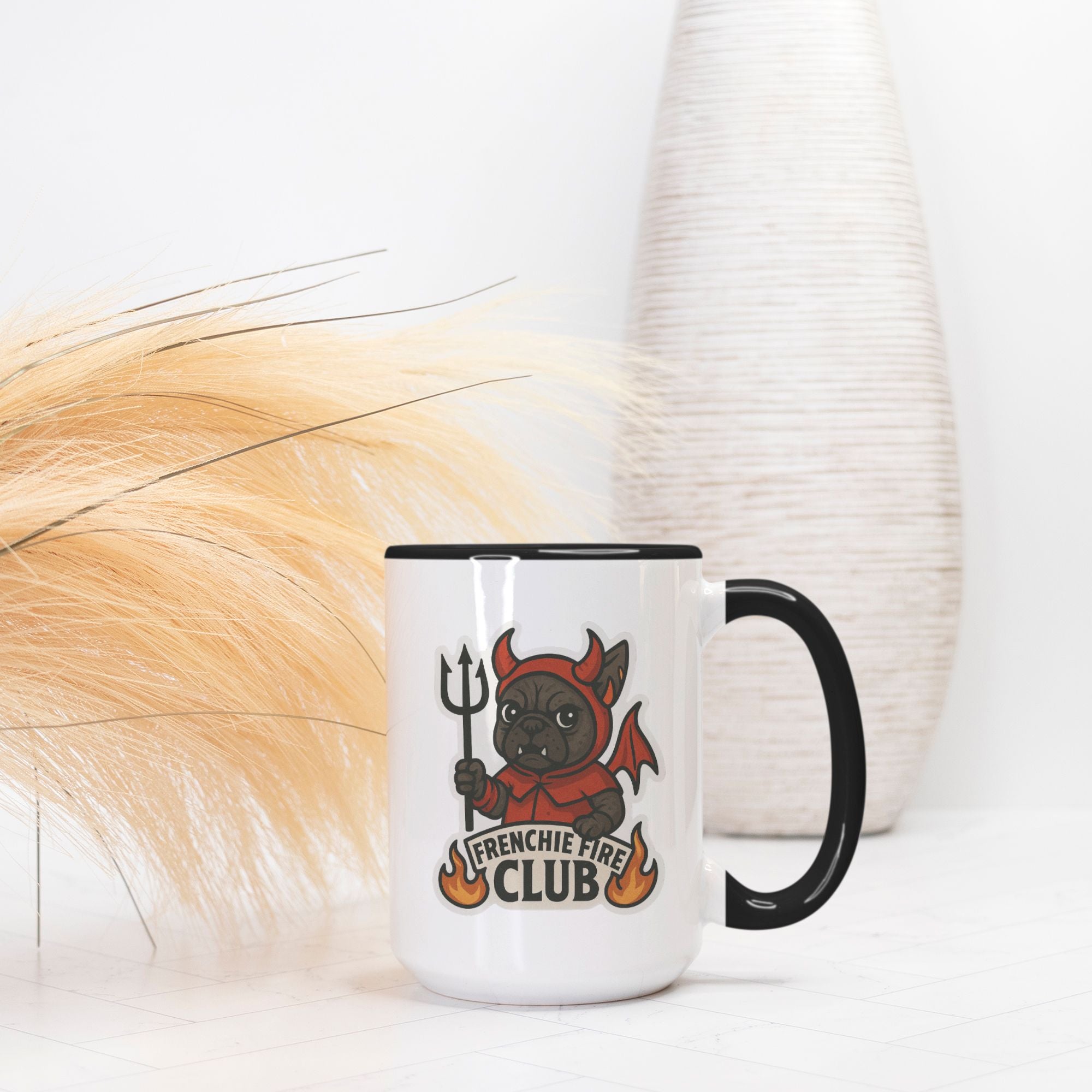 Banjo Frenchie Fire Club Mug featuring illustrated French Bulldog character in red fire-club costume holding a trident.