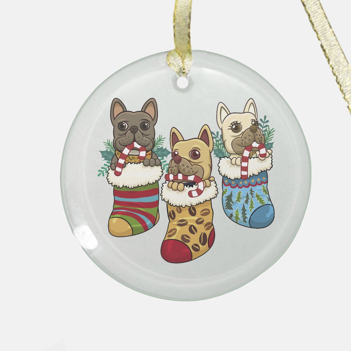 Clear glass Christmas ornament featuring three French Bulldogs peeking from festive stockings with candy canes, part of A Very Frenchie Christmas collection